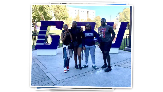 Group in front of GCU logo