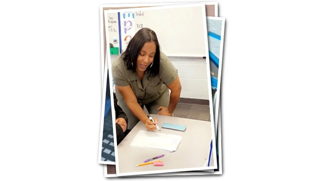 Ms. Robert helping a student