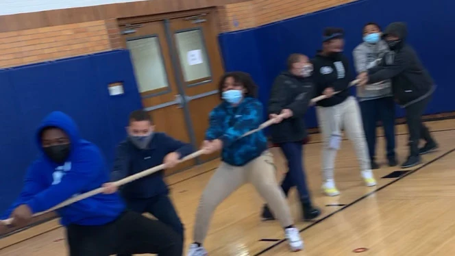 Students playing tug-of-war.