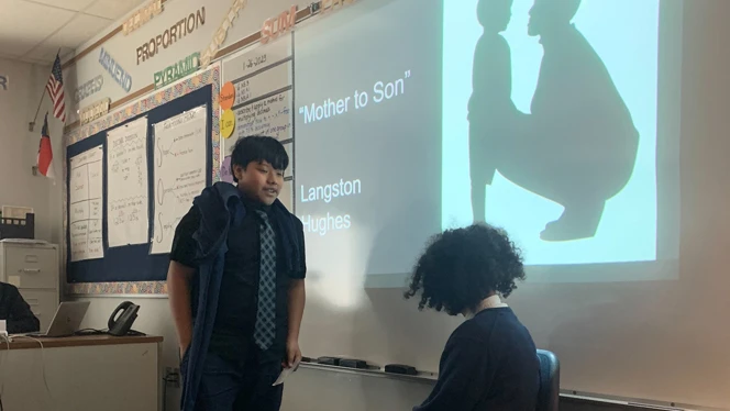 student preforming their poem