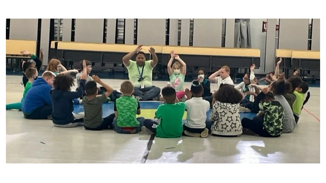 Steve Ventura exercising with students. Steve Ventura exercising with students.