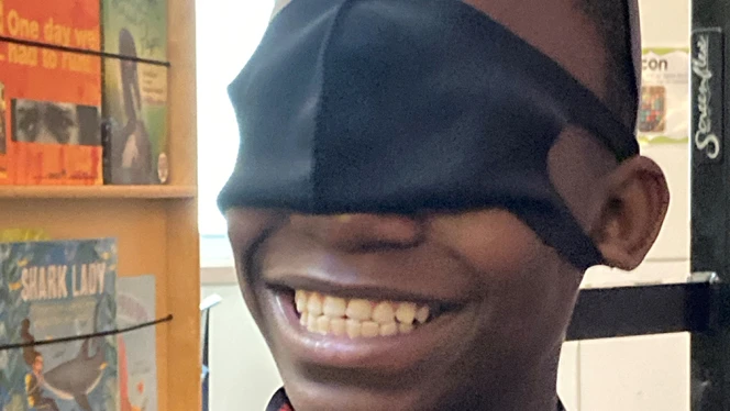 Valentino wearing a mask over his eyes. Valentino wearing a mask over his eyes.
