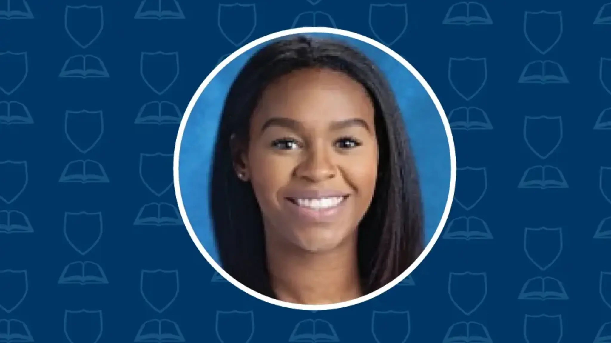 a woman smiling with a blue background