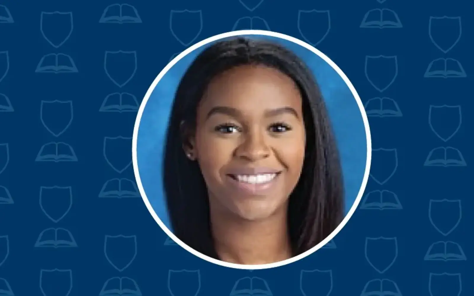 a woman smiling with a blue background