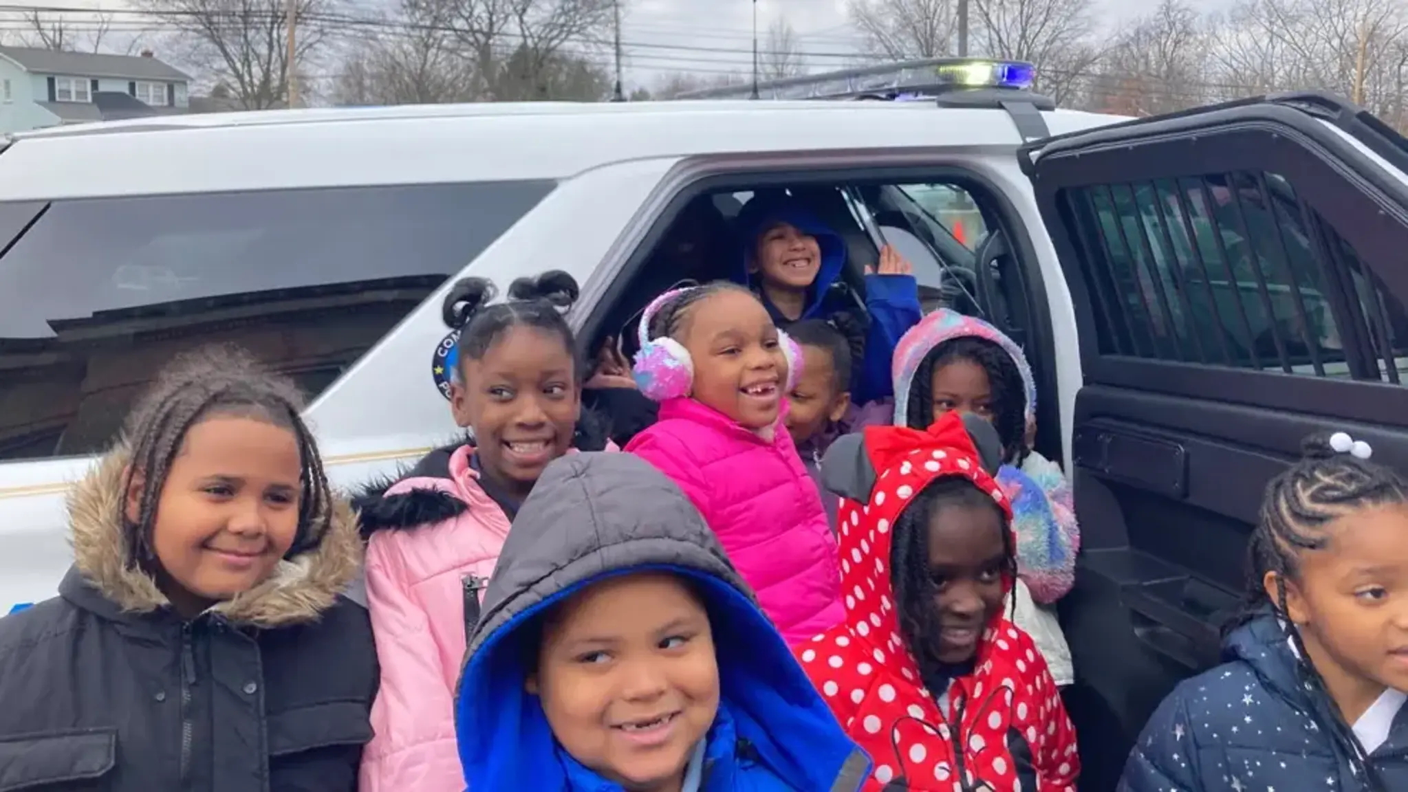 School Works with Local Police to Fill-A-Cruiser with Toys for Scholars