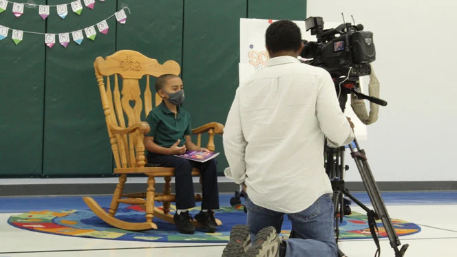 Fox 2 interviewing East Arbor student