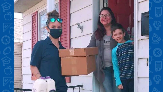 Woman dropping box off at a house. Woman dropping box off at a house.