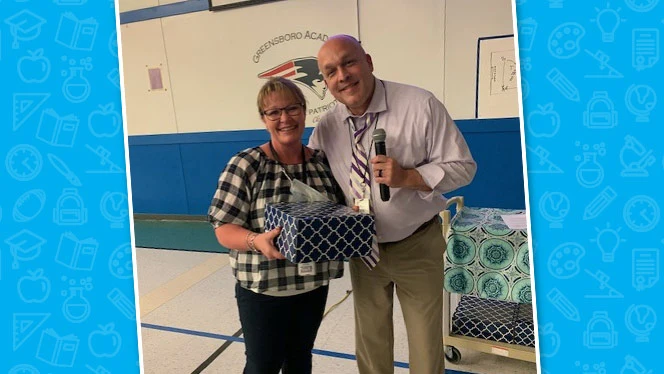Hower with a woman holding a box.