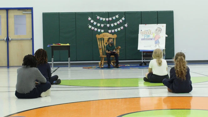 East Arbor students listening to a book reading