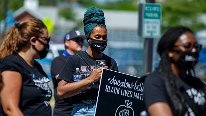Detroit Enterprise staff patriciate in Peace March