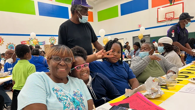 Grandparents and students smiling. Grandparents and students smiling.