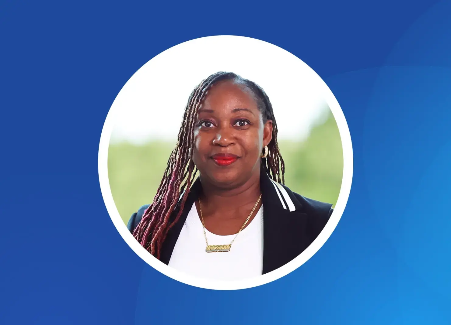 a woman with braids wearing a black jacket and a white shirt