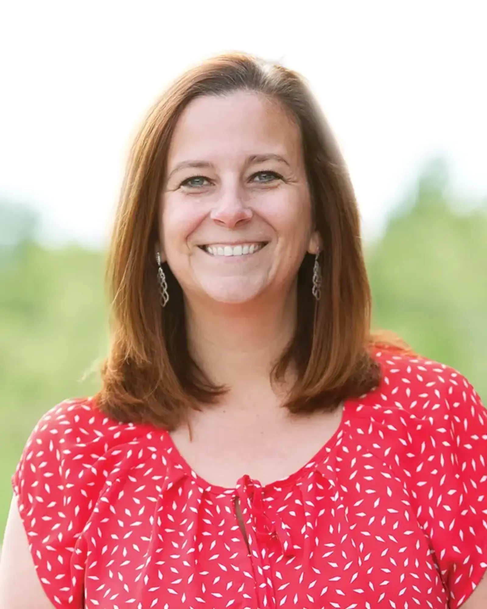 a woman smiling at camera