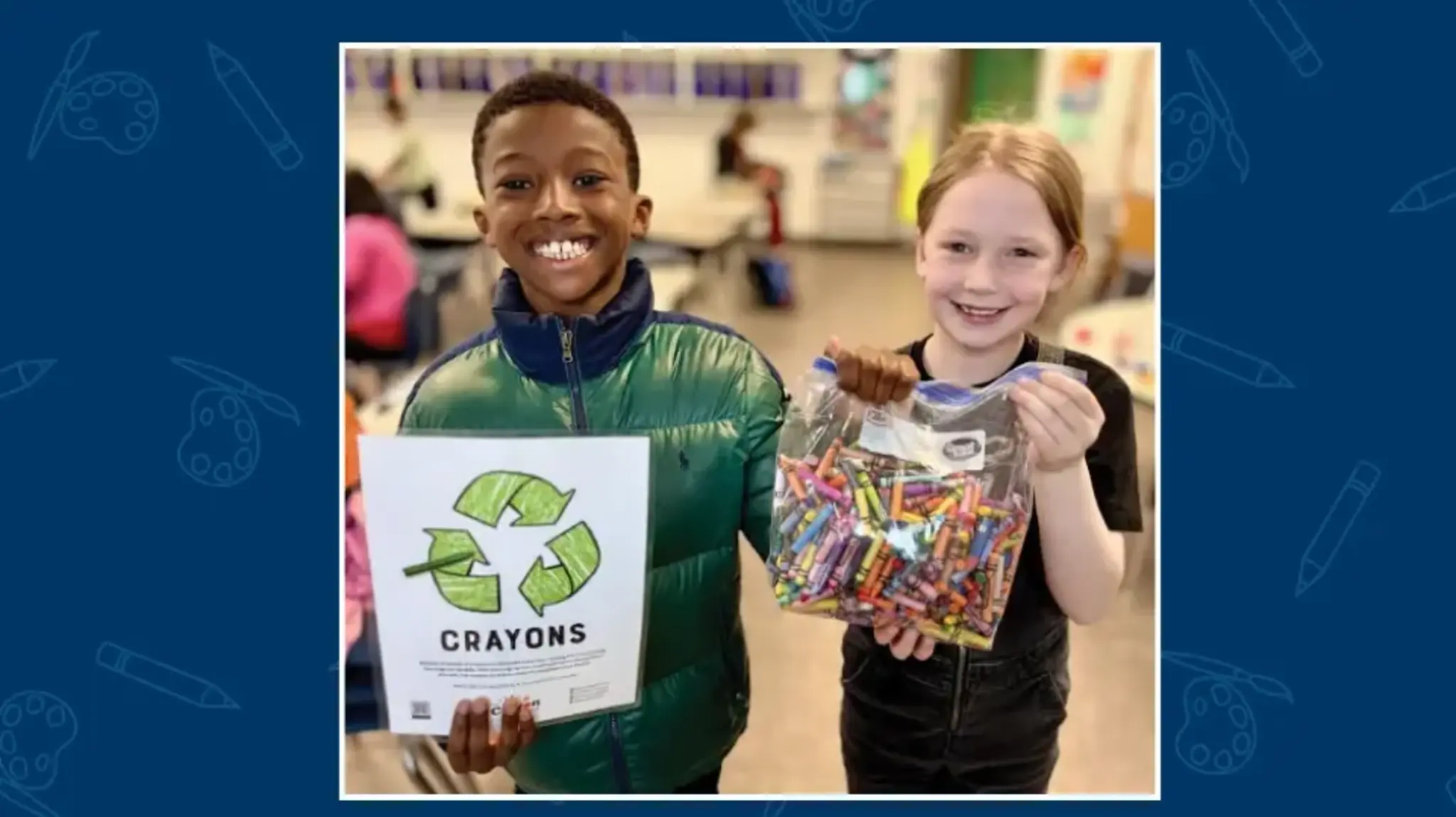 a boy and girl holding crayons