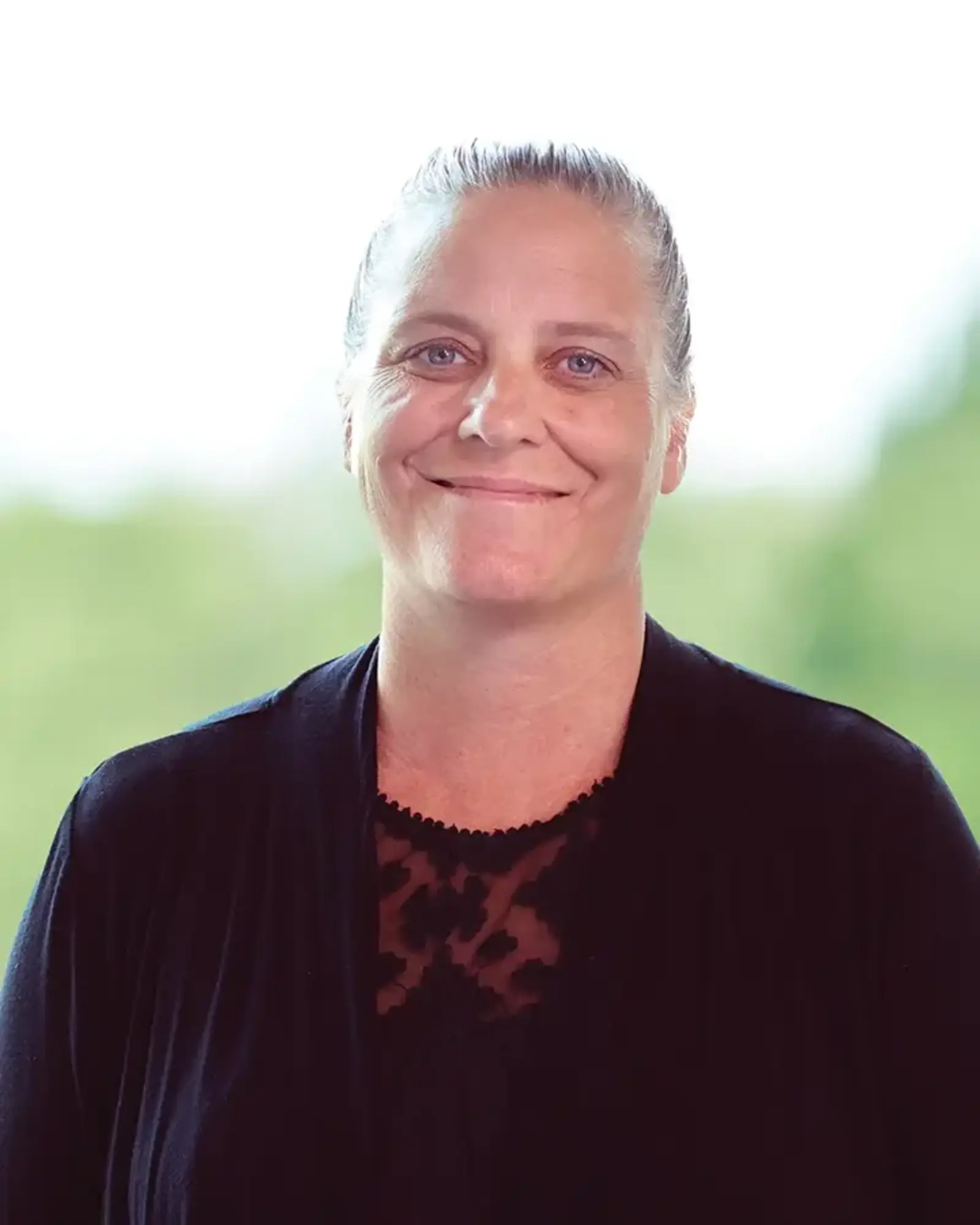 a woman smiling at camera
