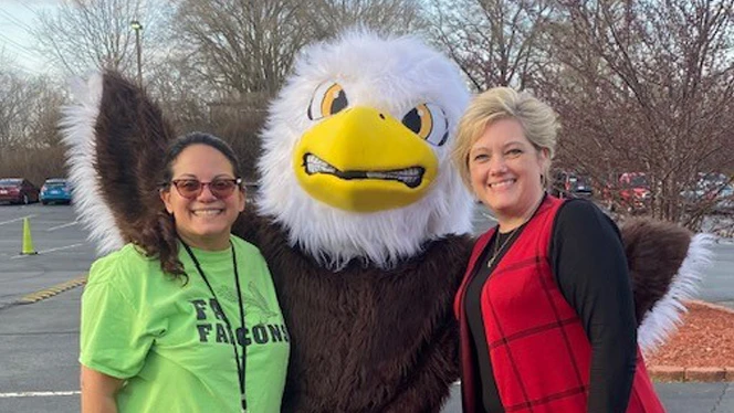 Wendy Barajas posing with an eagle mascot Wendy Barajas posing with an eagle mascot