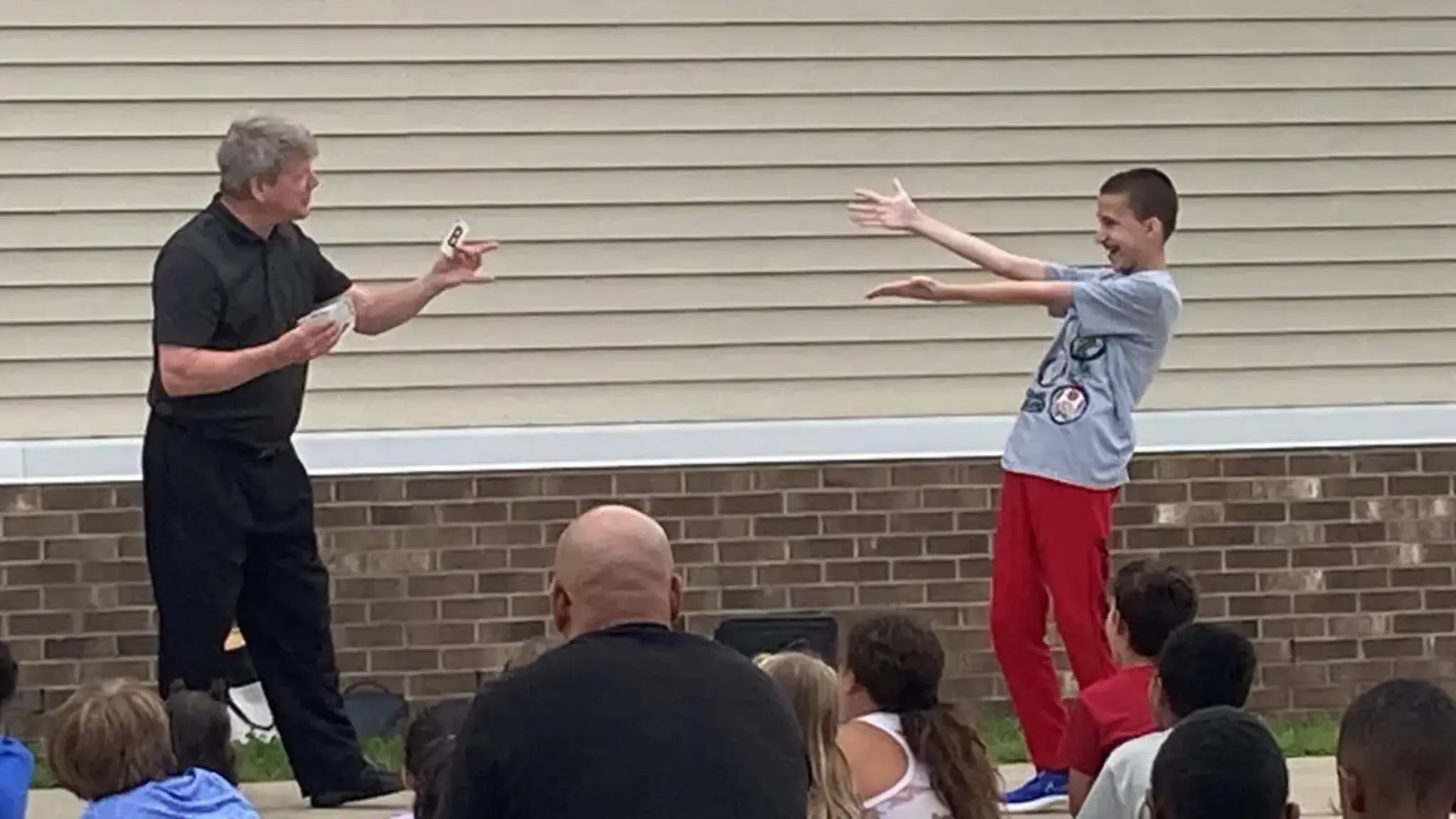 Magician Delights East Arbor Crowd at Family Event