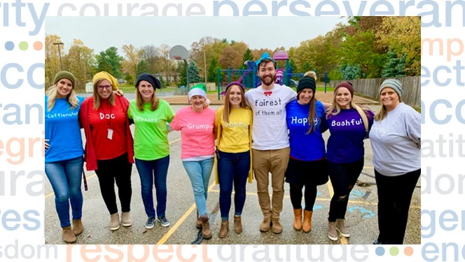 Teachers standing in a line. Teachers standing in a line.