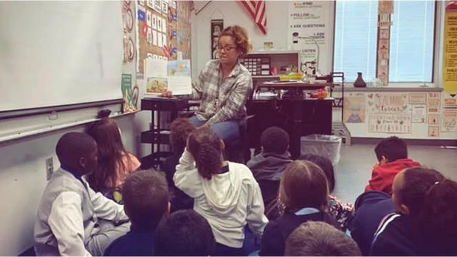 K-8 School in Springfield: Endeavor science teacher, Chavez-VanBemden, with her class.