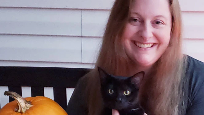 Amy Sheppard with a cat Amy Sheppard with a cat