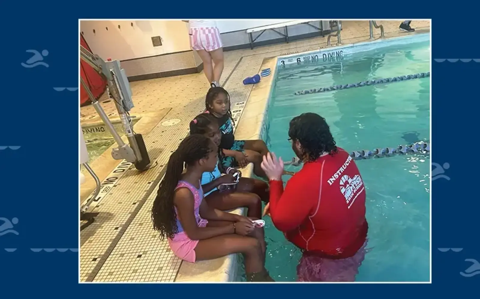 a group of people sitting in a pool