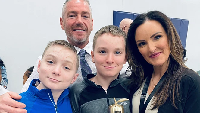K-8 School in Flint: Voight poses for a photo with her family after the assembly.