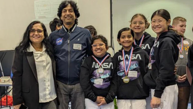 K-8 School in Canton: Canton Charter Robotics team pose after their win at a regional Robofest competition.