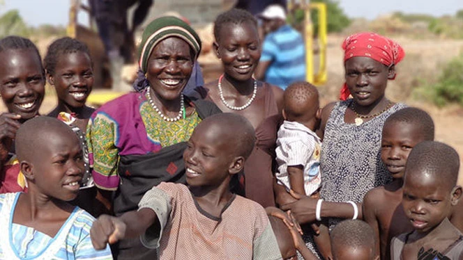 South Sudanese people smiling. South Sudanese people smiling.