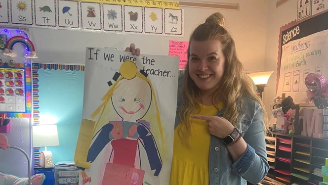 Lauren Matherly holding up a students If I were the Teacher craft. Lauren Matherly holding up a students If I were the Teacher craft.