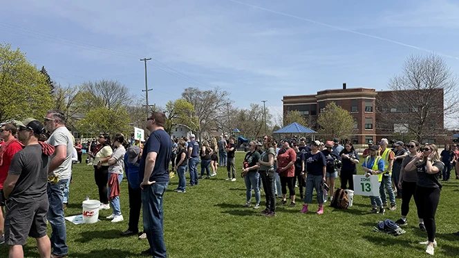 K-8 School in Grand Rapids: River City Scholars volunteered with Friends of Grand Rapids Parks to plant trees.