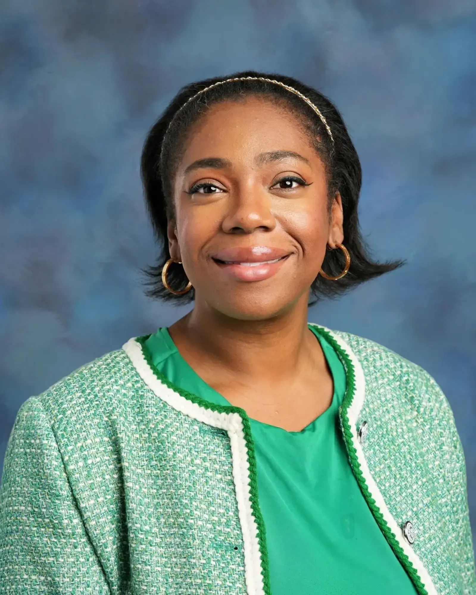 a woman in a green jacket