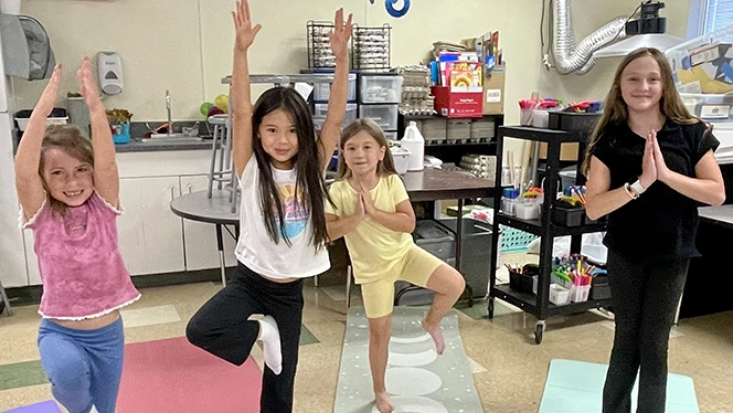 K-8 School in Commerce City: Landmark Academy at Reunion holds a successful Yoga Club.