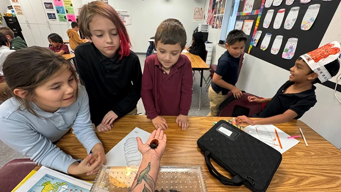 K-8 School in Commerce City: Landmark Academy students join new Bug Club.