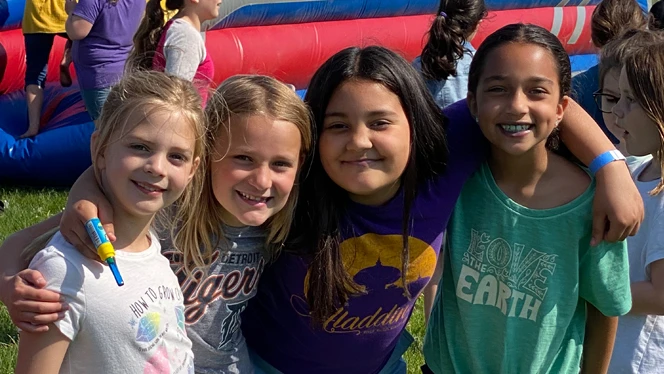 Four girls smiling Four girls smiling