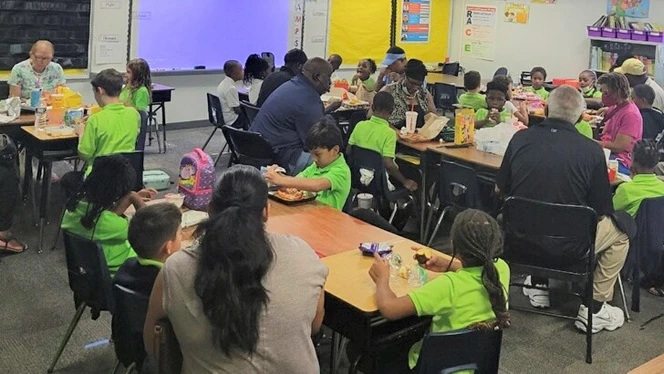 Grandparents and students eating. Grandparents and students eating.