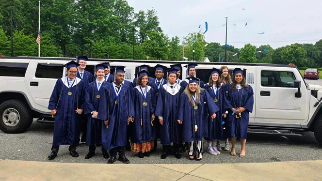 Phoenix Academy Class of 2024 arriving to graduation in limo