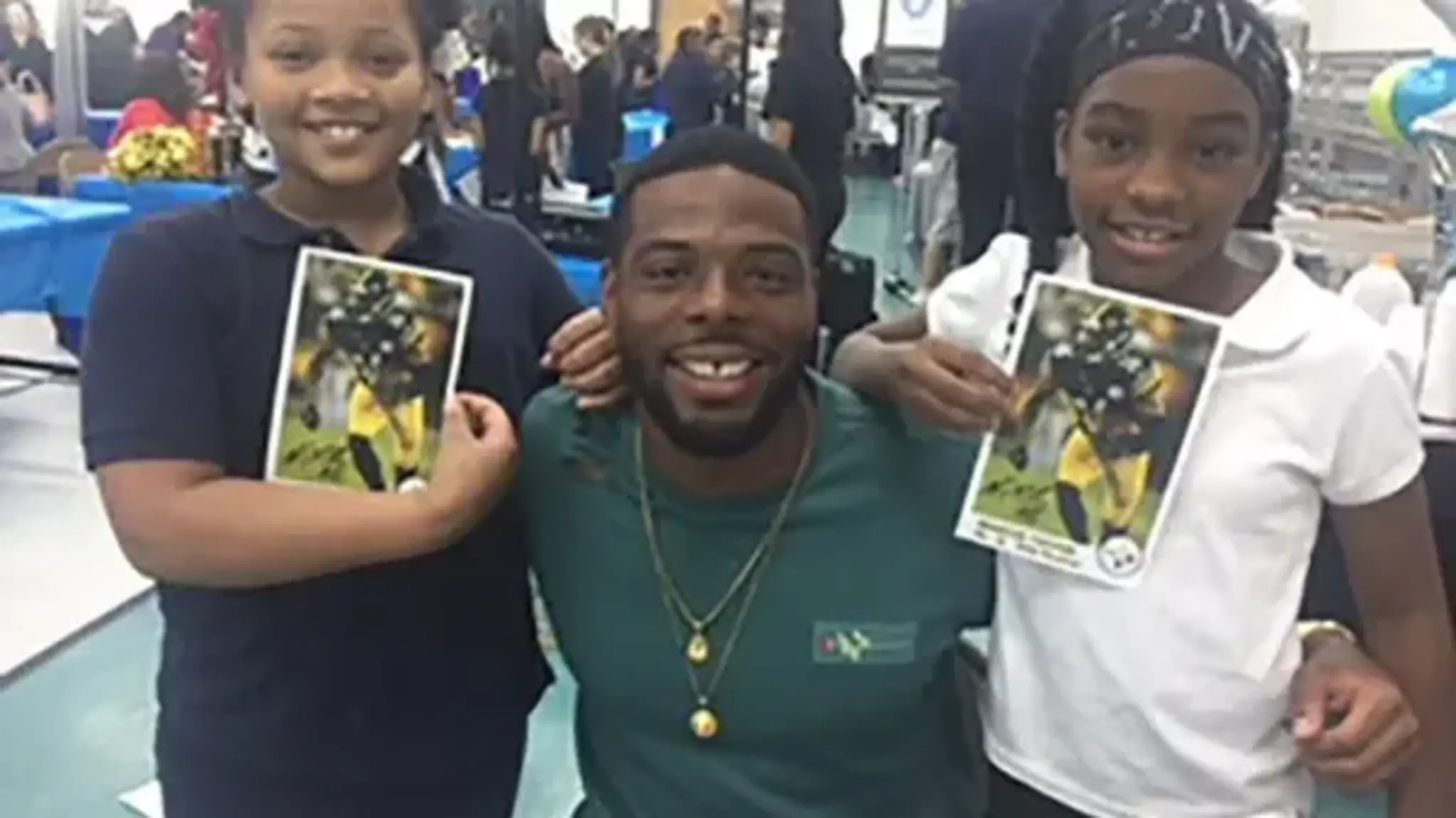 NFL Player, Professionals Speak to Students