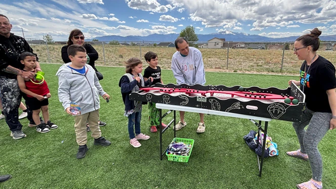 K-8 School in Colorado Springs: Mountain View Academy families play carnival games during Yeti For Summer.