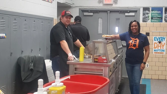 Cafeteria workers smiling. Cafeteria workers smiling.