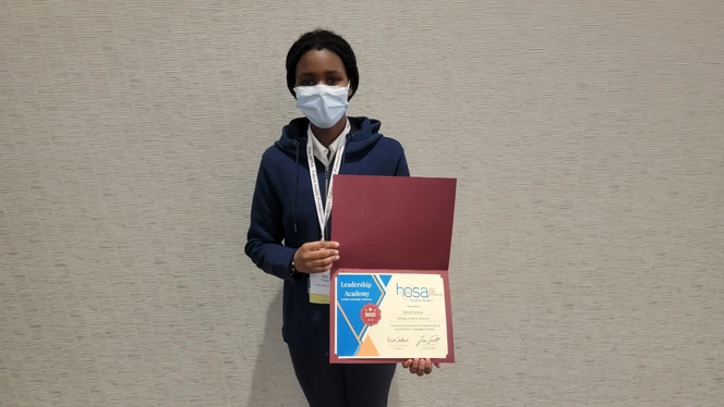 Pathway student with award
