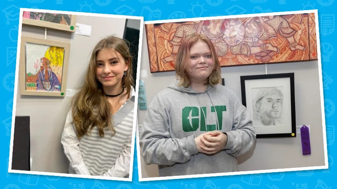 Students standing in front of their artwork