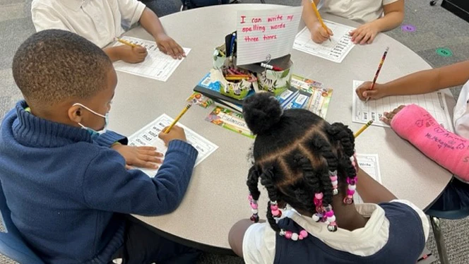 Pembroke students writing