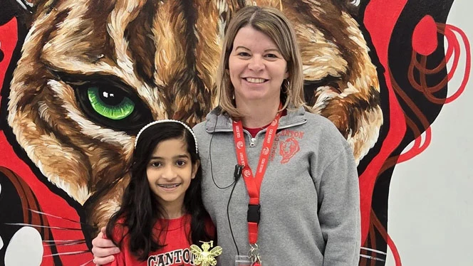 Divya C. with Canton Charter Principal Ms. Conley.