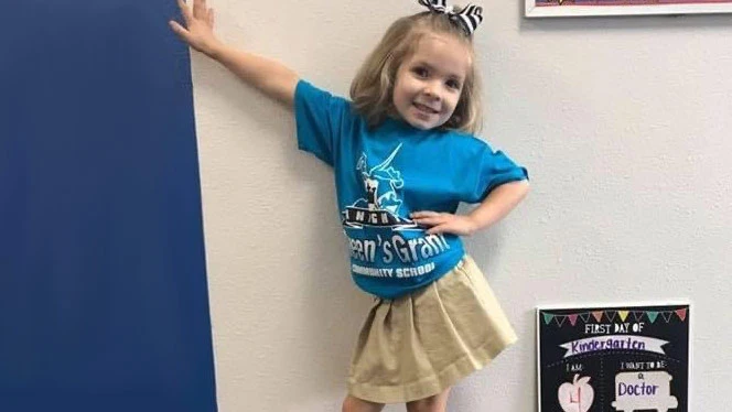 A young girl smiling. A young girl smiling.