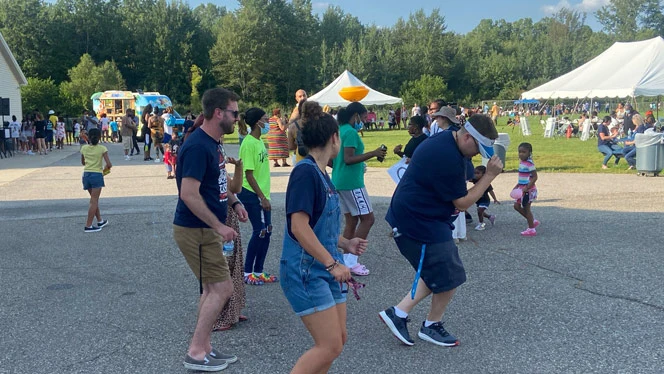 People dancing outdoors. People dancing outdoors.