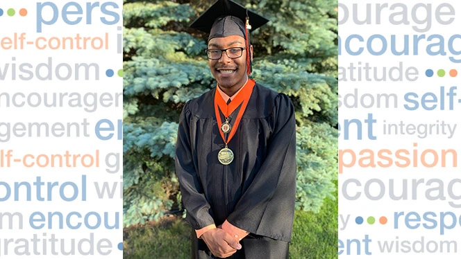 Shane Tinsley wearing a graduation cap. Shane Tinsley wearing a graduation cap.