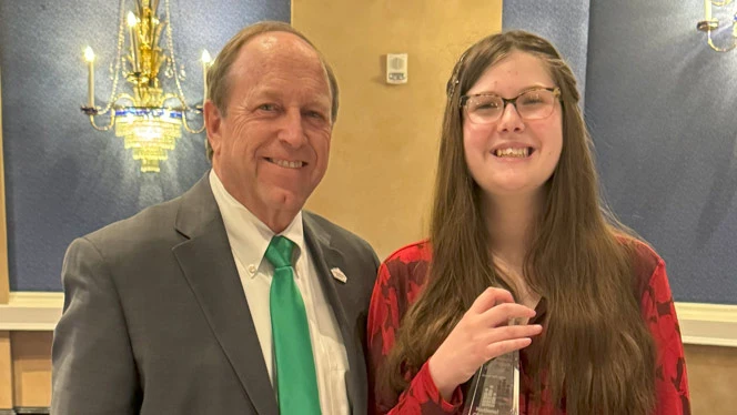 Hastings with former CO Springs Mayor John Suthers.