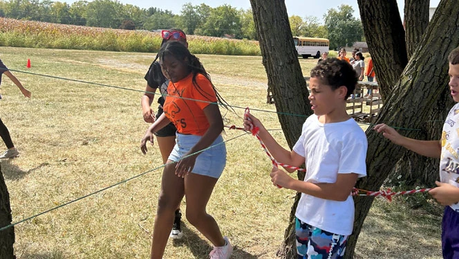 K-8 School in Dayton: Pathway students participating in team building activity at Great Life Farms.