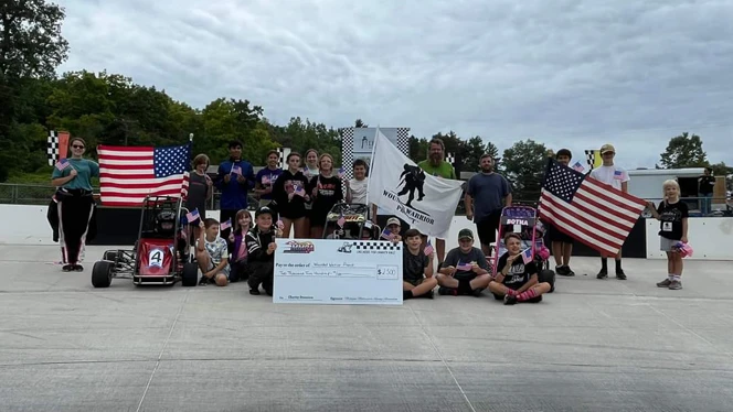 In mid-August, the club raised money during race day for the Wounded Warrior Project. In mid-August, the club raised money during race day for the Wounded Warrior Project.