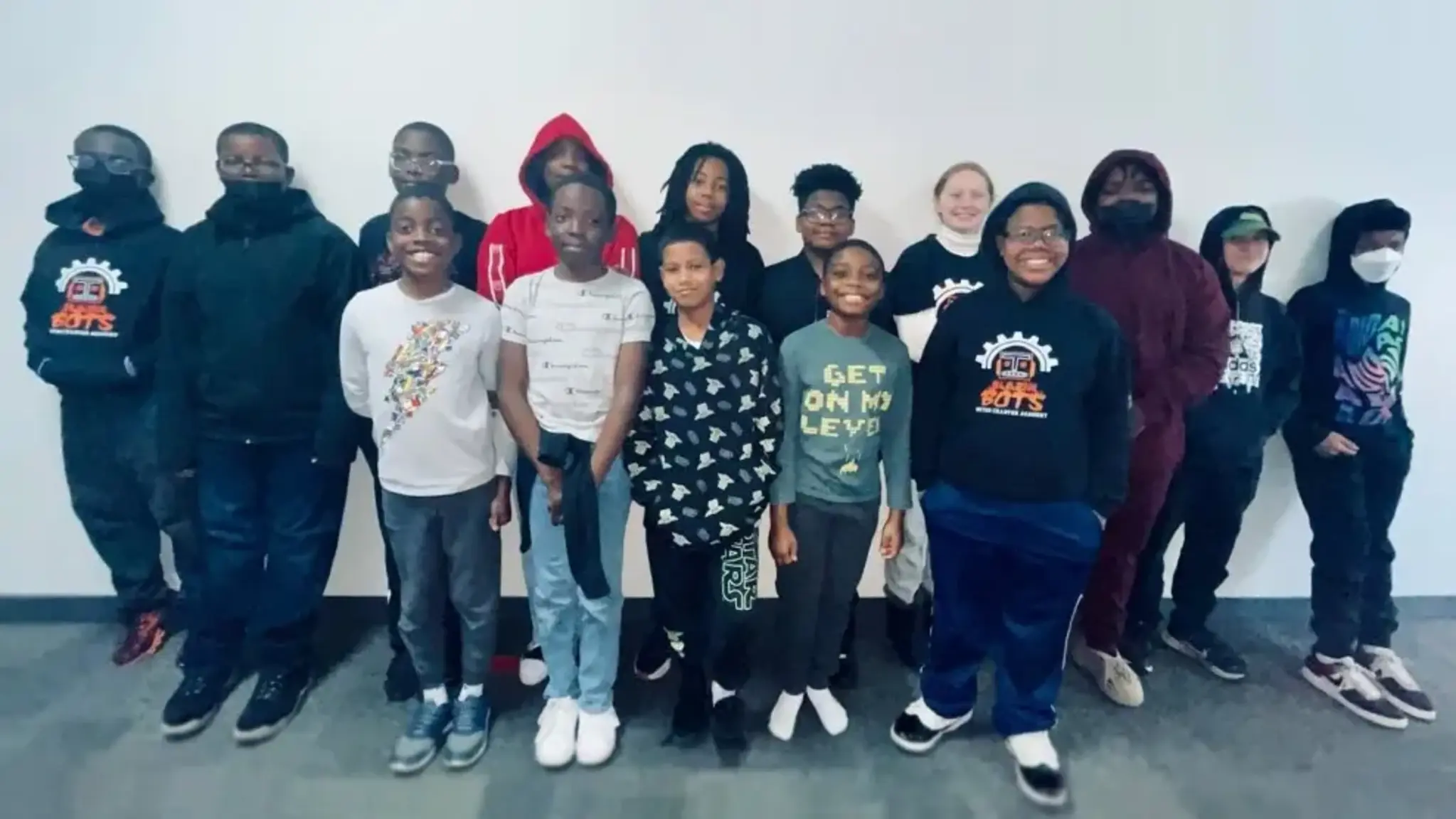 Unlikely Duo Coaches School’s Robotics Team